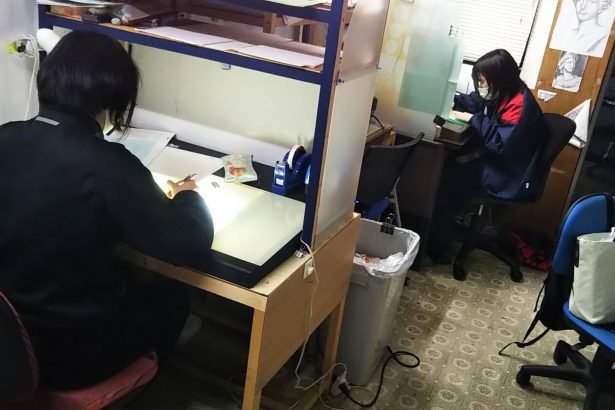 Animators drawing animation in anime studio